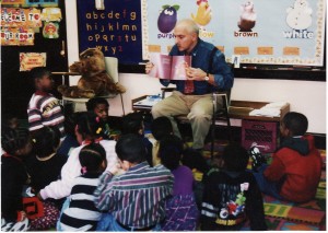 George reads to children copy